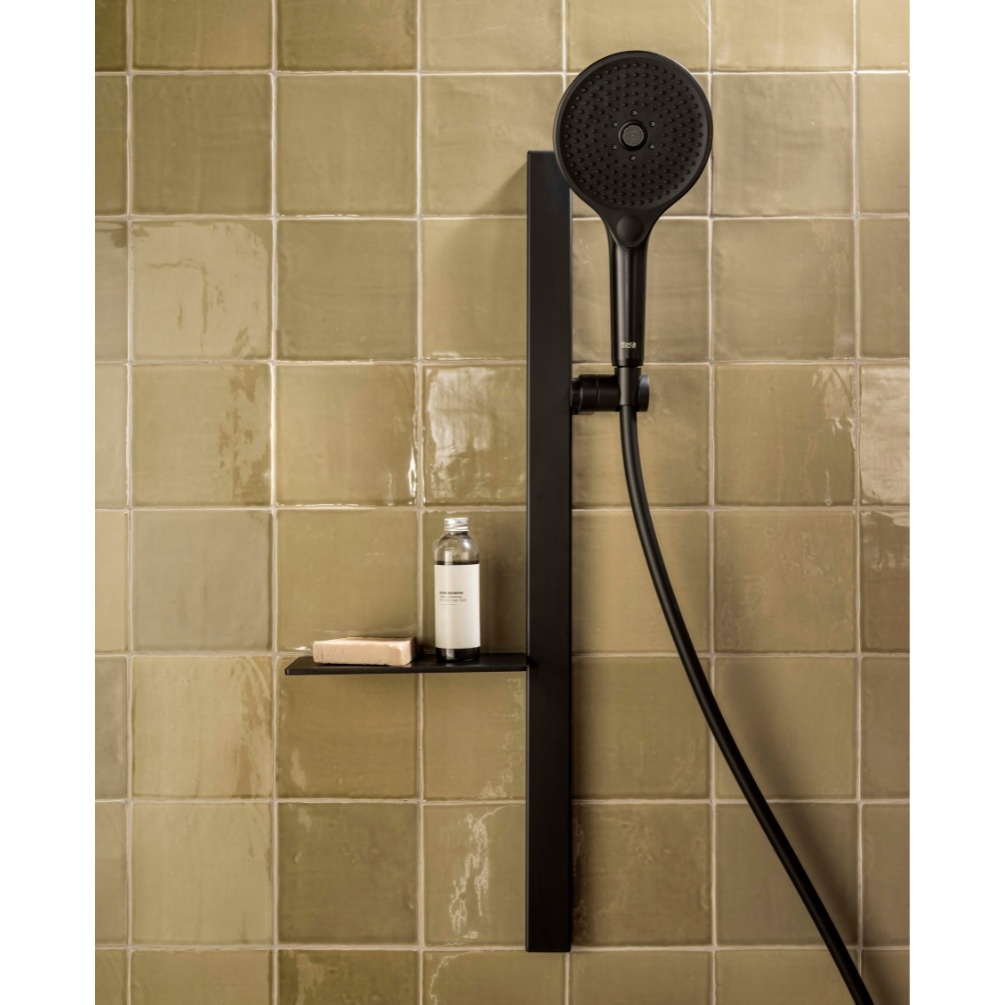 Lifestyle image of the Roca Plenum Matt Black Compact Slide Rail Shower Kit